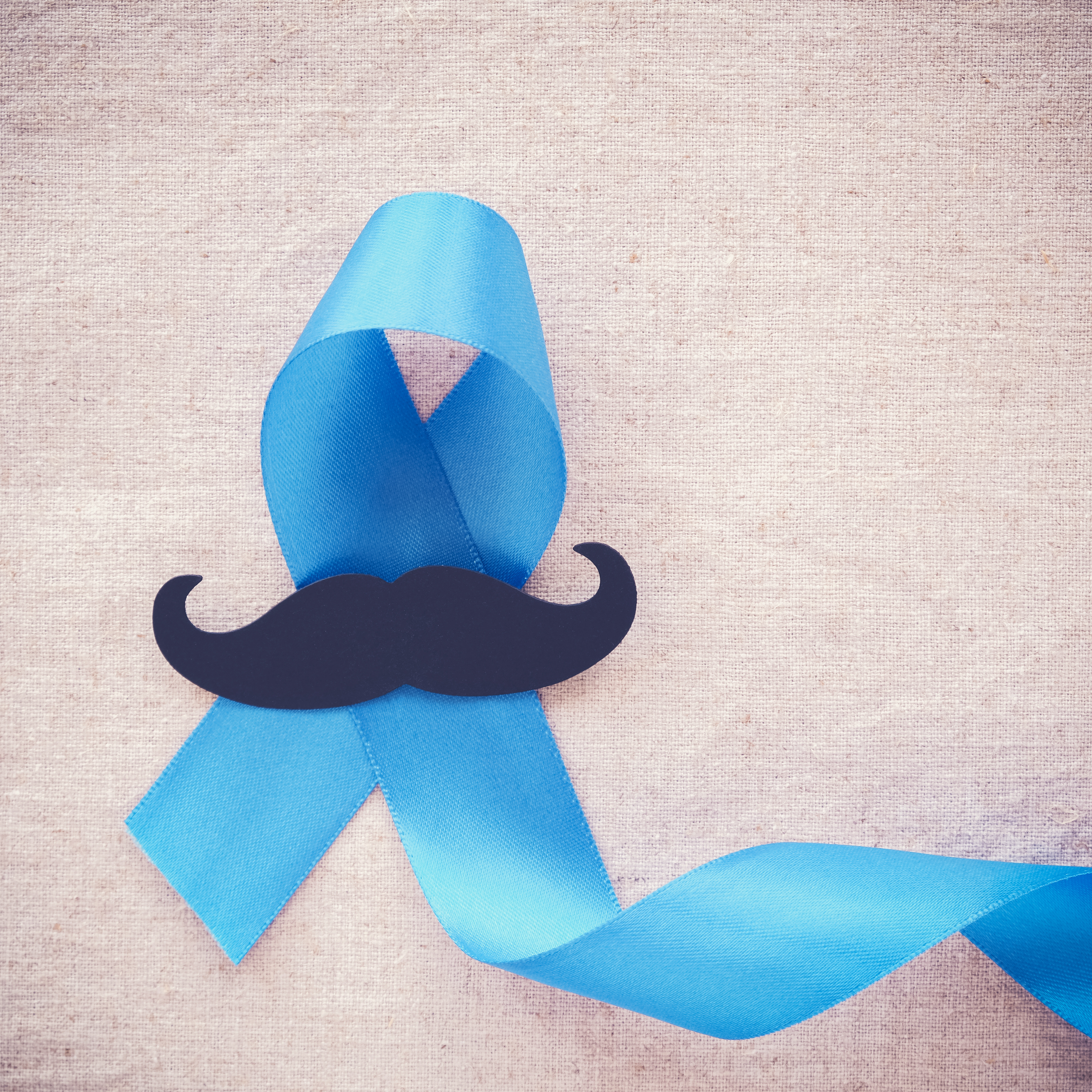 Movember Blue Ribbon Mustache Logo